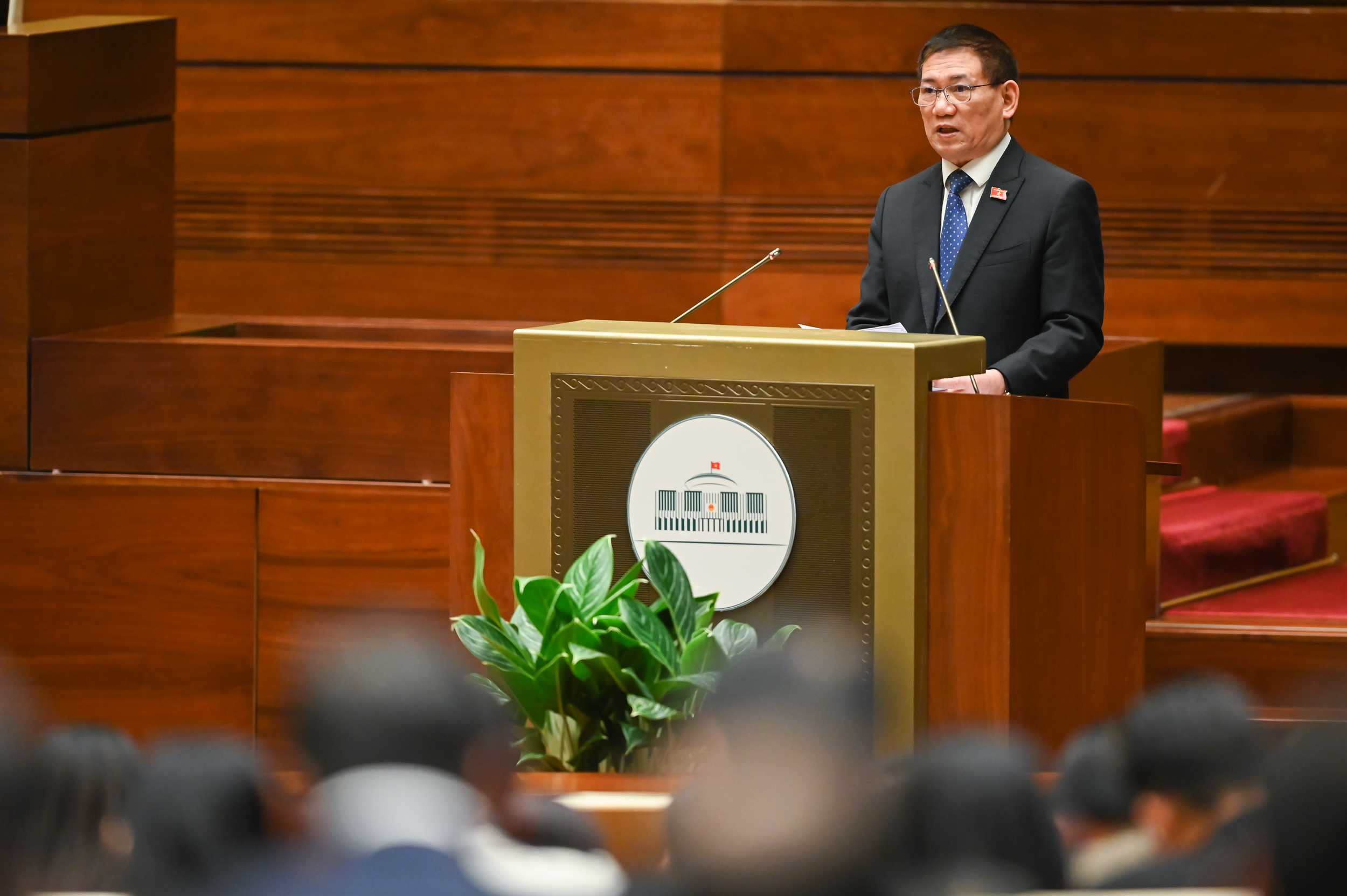 Bộ trưởng Bộ Tài chính Hồ Đức Phớc trình bày báo cáo đánh giá tình hình thực hiện ngân sách nhà nước năm 2022.