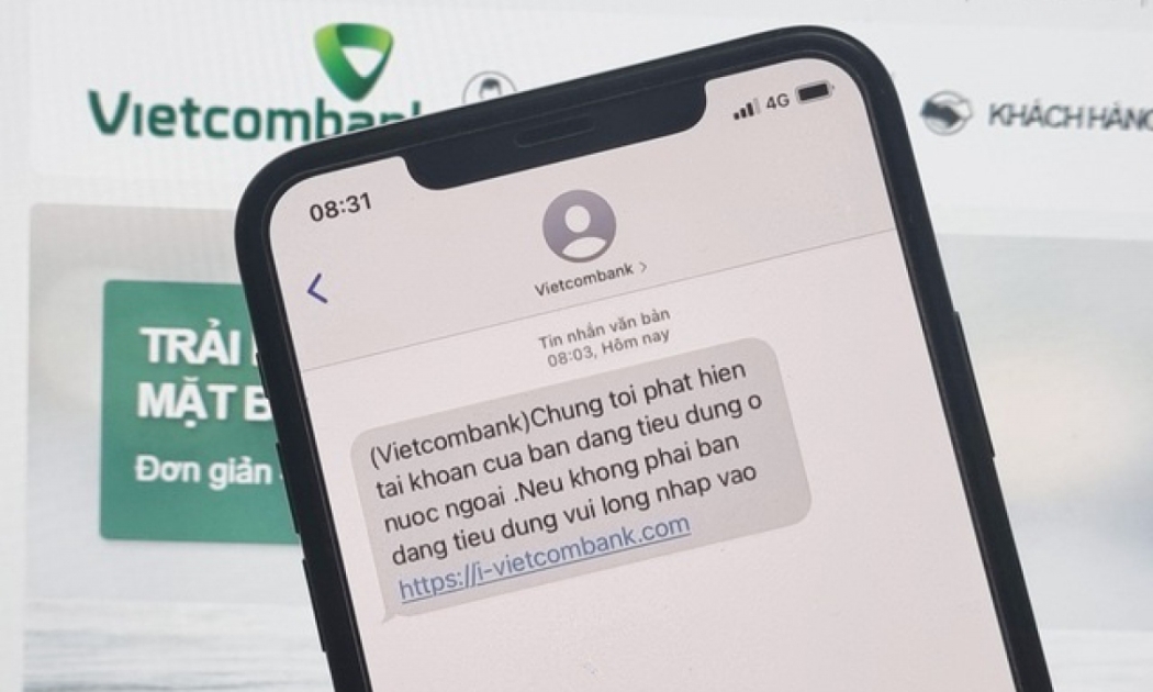 Lừa đảo tin nhắn SMS có kèm đường dẫn đến website giả mạo ngân hàng Vietcombank. (Ảnh minh họa).