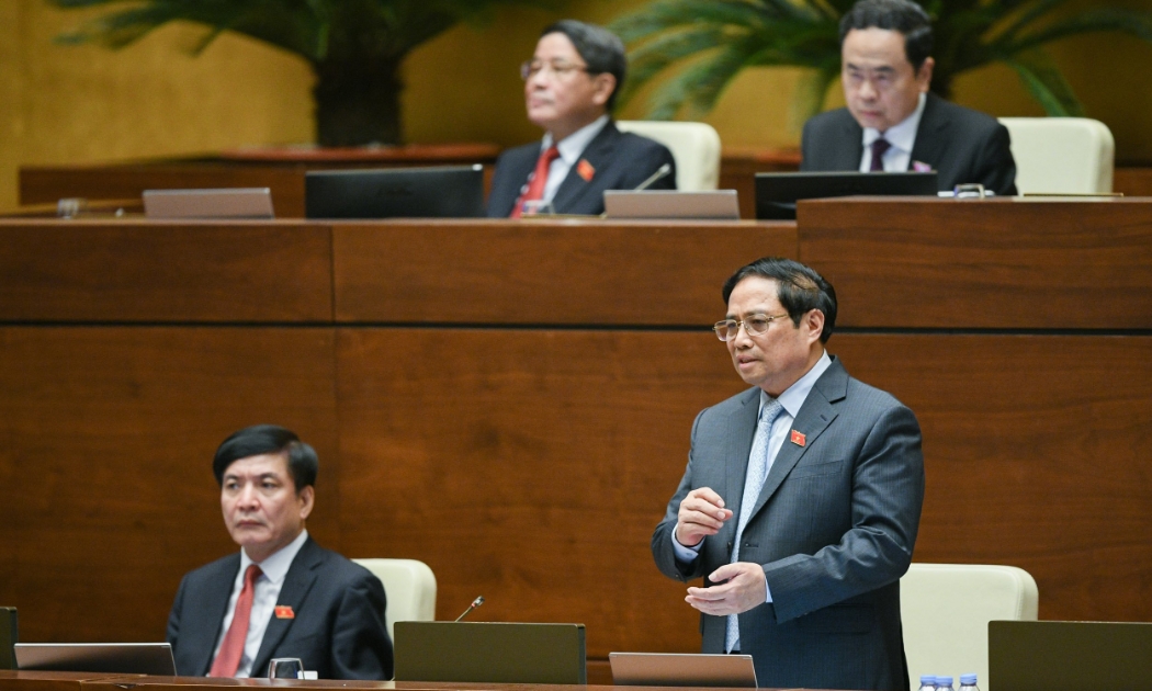 Thủ tướng Chính phủ Phạm Minh Chính báo cáo giải trình và trả lời chất vấn trước Quốc hội - Ảnh: Quochoi.vn.