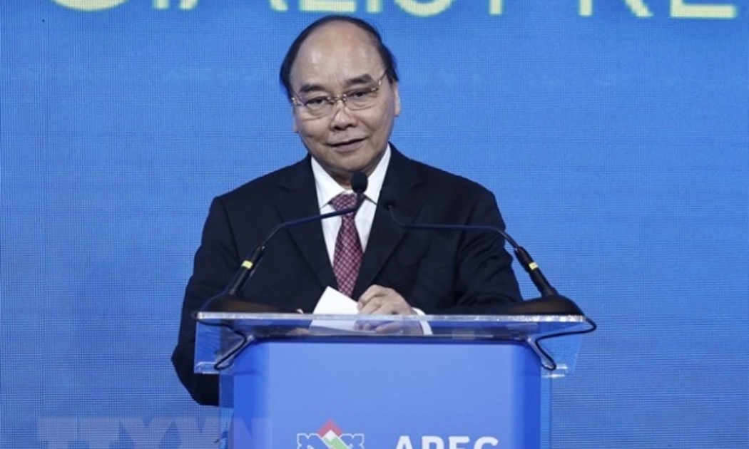 Chủ tịch nước Nguyễn Xuân Phúc là một trong những diễn giả chính của hội nghị năm nay - Ảnh: TTXVN