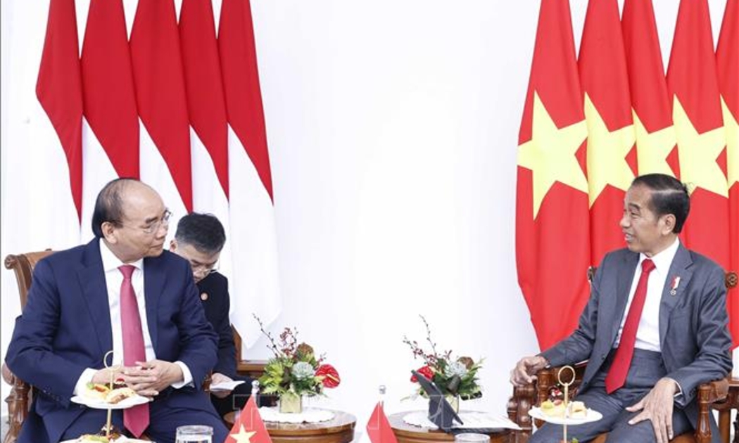 Chủ tịch nước Nguyễn Xuân Phúc và Tổng thống Joko Widodo - Ảnh: TTXVN