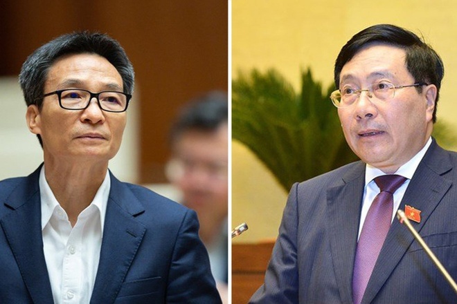 Ông Vũ Đức Đam (trái) và ông Phạm Bình Minh (phải)