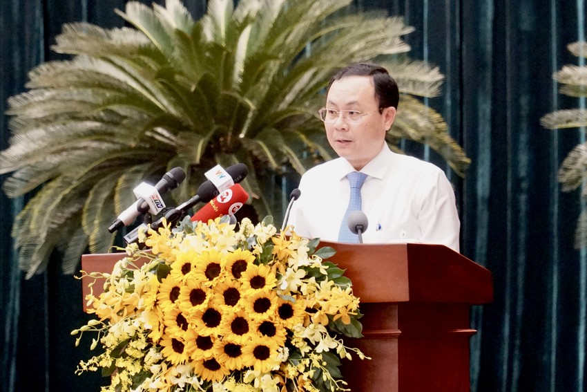 Ông Nguyễn Văn Hiếu, Phó Bí thư Thành ủy TP.HCM, trình bày chương trình hành động thực hiện Nghị quyết 31 - Ảnh: PC.   