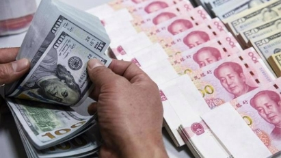 Central bank raises forex reserves as pressure eases