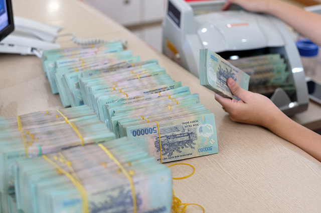 Giảm lãi suất huy động sẽ giúp lãi suất cho vay hạ nhiệt.