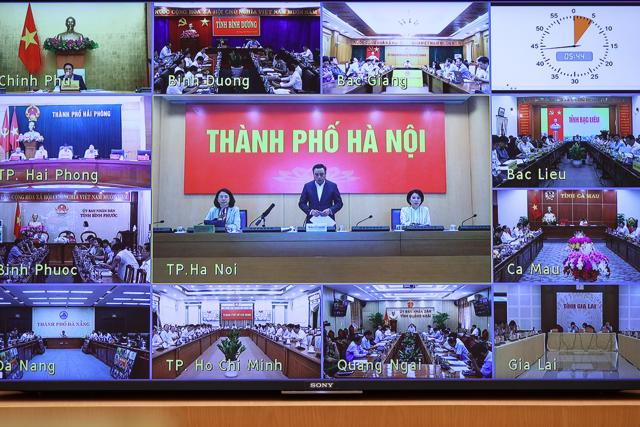 C&aacute;c tỉnh, th&agrave;nh phố tham dự hội nghị theo h&igrave;nh thức trực tuyến - Ảnh: VGP