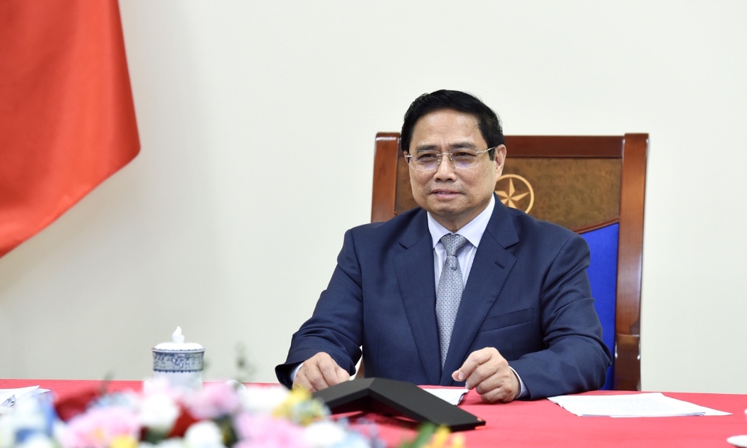 Thủ tướng Phạm Minh Chính đề nghị hai bên tích cực nghiên cứu các biện pháp duy trì giao thương thông suốt, nâng cao năng lực, hiệu suất thông quan - Ảnh: VGP