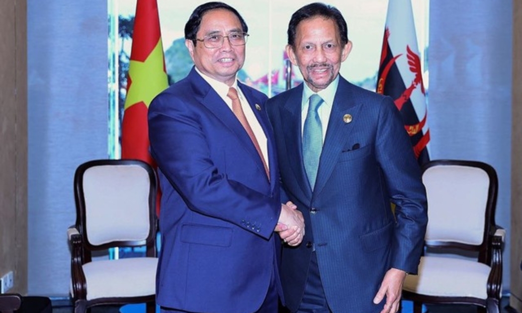 Thủ tướng Phạm Minh Chính và Quốc vương Brunei Darussalam Sultan Haji Hassanal Bolkiah - Ảnh: VGP