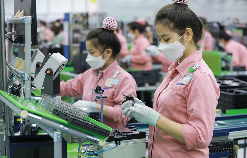 Chính sách ưu đãi về thuế đã góp phân thu hút mạnh mẽ vốn FDI vào Việt Nam. Ảnh: TTXVN.