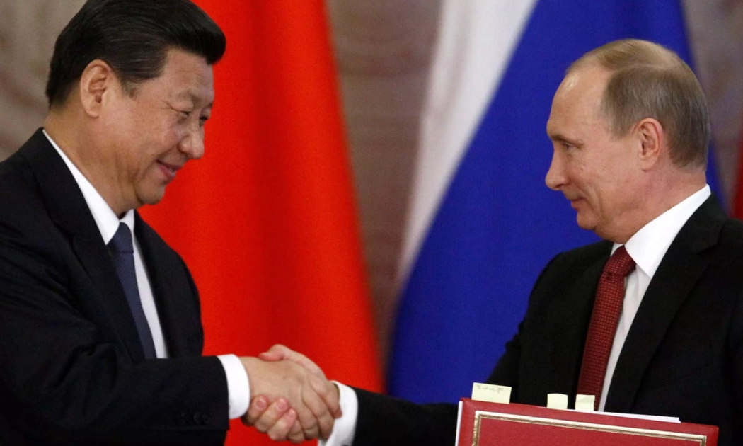 Chủ tịch Trung Quốc Tập Cận Bình và Tổng thống Nga Vladimir Putin - Ảnh: Reuters