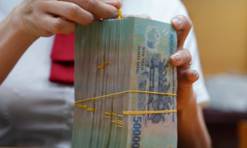 Lãi suất tiền gửi sẽ giảm xuống 6,5%/năm trong năm nay?