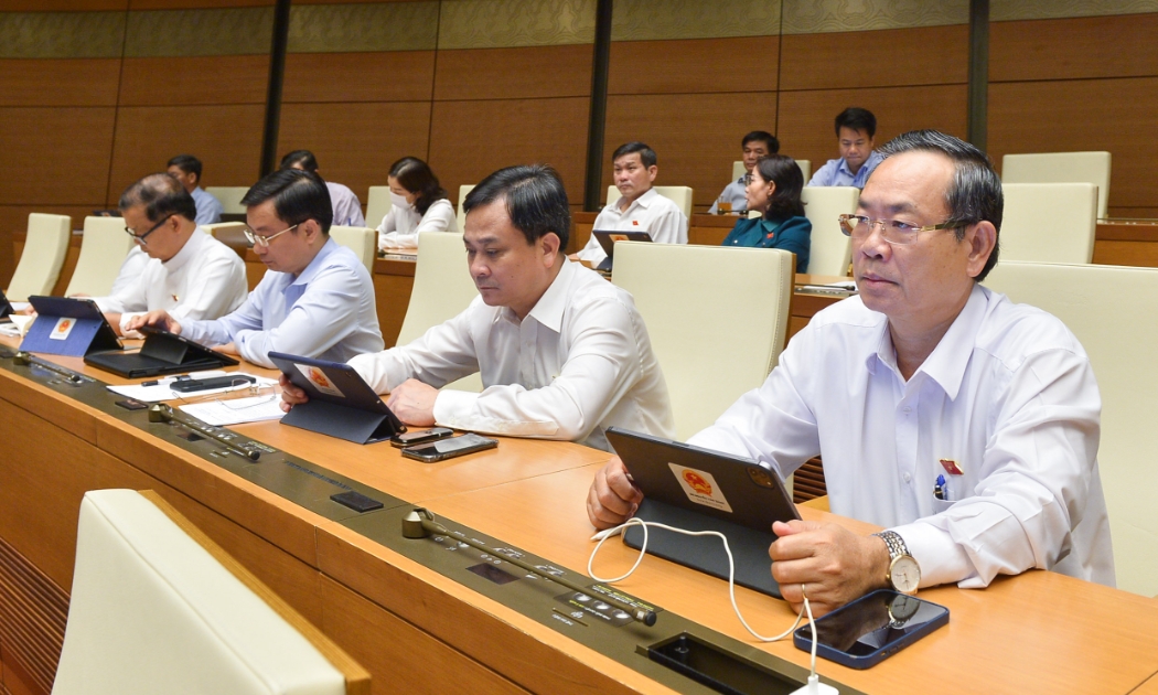  Quốc hội thảo luận tại hội trường về dự án Luật Căn cước công dân (sửa đổi), chiều 22/6. Ảnh - Quochoi.vn.