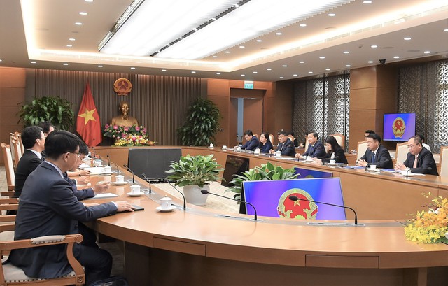 Deputy Prime Minister Le Minh Khai meets with the leaders from KDB and IBK in Hanoi on June 23. Photo: VGP