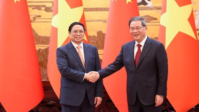 China pledges to further open up to Vietnamese products