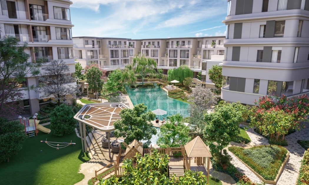 Khu sân vườn nội bộ được bao bọc bởi bãi cỏ xanh mướt, cùng cây cao mang màu sắc nhiệt đới mang cảm giác như “ốc đảo bình yên”.
