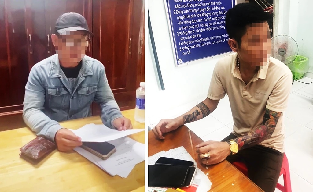 Hai đối tượng L.V.H và N.N.T được mời làm việc tại cơ quan điều tra. (Ảnh: PA05).