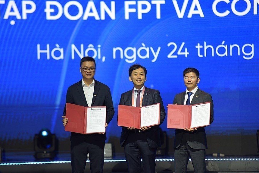 Đại diện FPT và TradeWaltz ký kết thỏa thuận hợp tác.