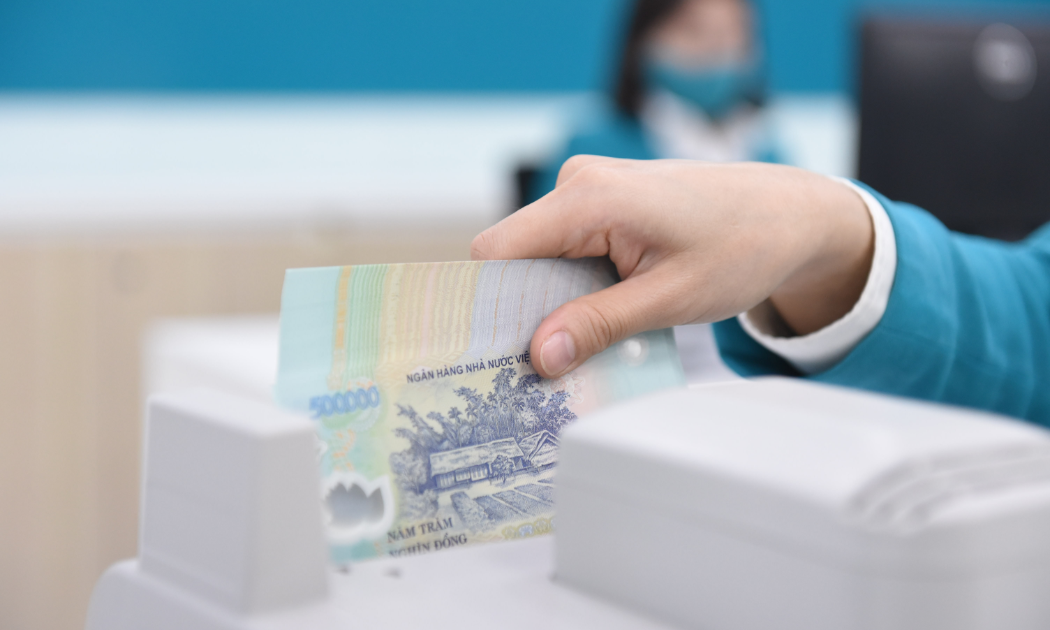 Giải ngân cho vay kết nối ngân hàng - doanh nghiệp trên địa bàn TP.HCM hiện đã vượt cam kết gần 15% - Ảnh minh họa