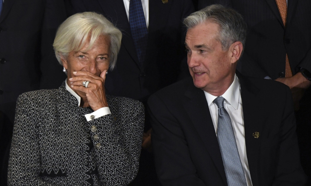 Chủ tịch ECB Christine Lagarde (trái) và Chủ tịch Fed Jerome Powell - Ảnh: Bloomberg.
