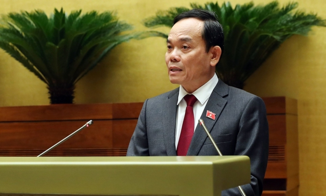 Phó Thủ tướng Trần Lưu Quang trình bày Báo cáo trước Quốc hội - Ảnh: VGP.