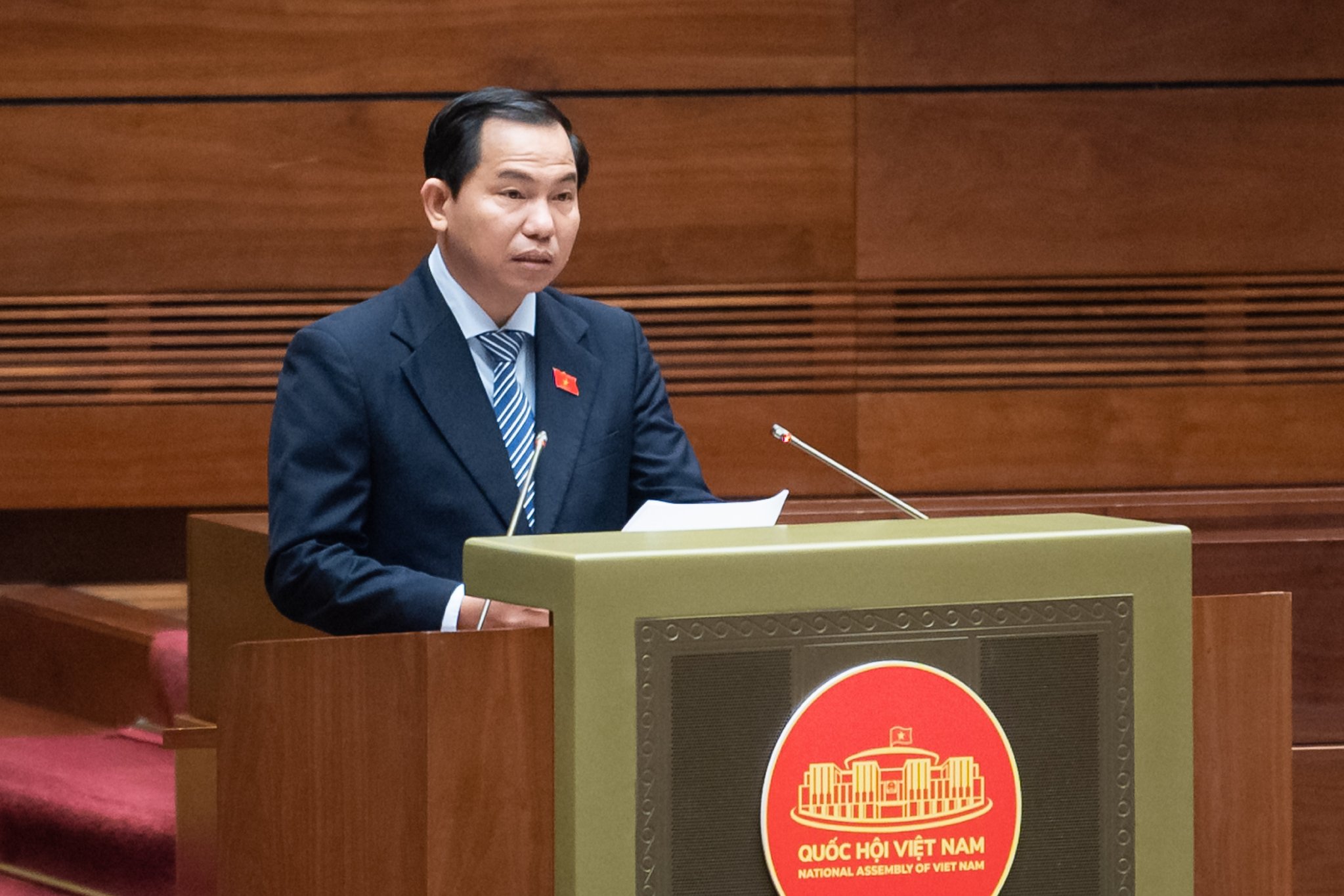 Chủ nhiệm Ủy ban Tài chính, Ngân sách của Quốc hội Lê Quang Mạnh báo cáo thẩm tra dự thảo Nghị quyết về việc áp dụng thuế thu nhập doanh nghiệp bổ sung theo quy định chống xói mòn cơ sở thuế toàn cầu.