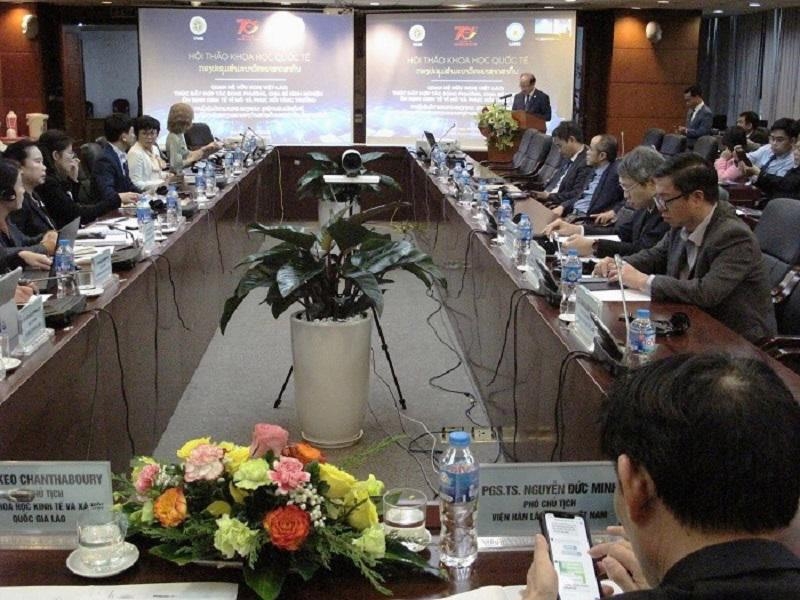 Seminar looks at Vietnam - Laos cooperation for growth recovery