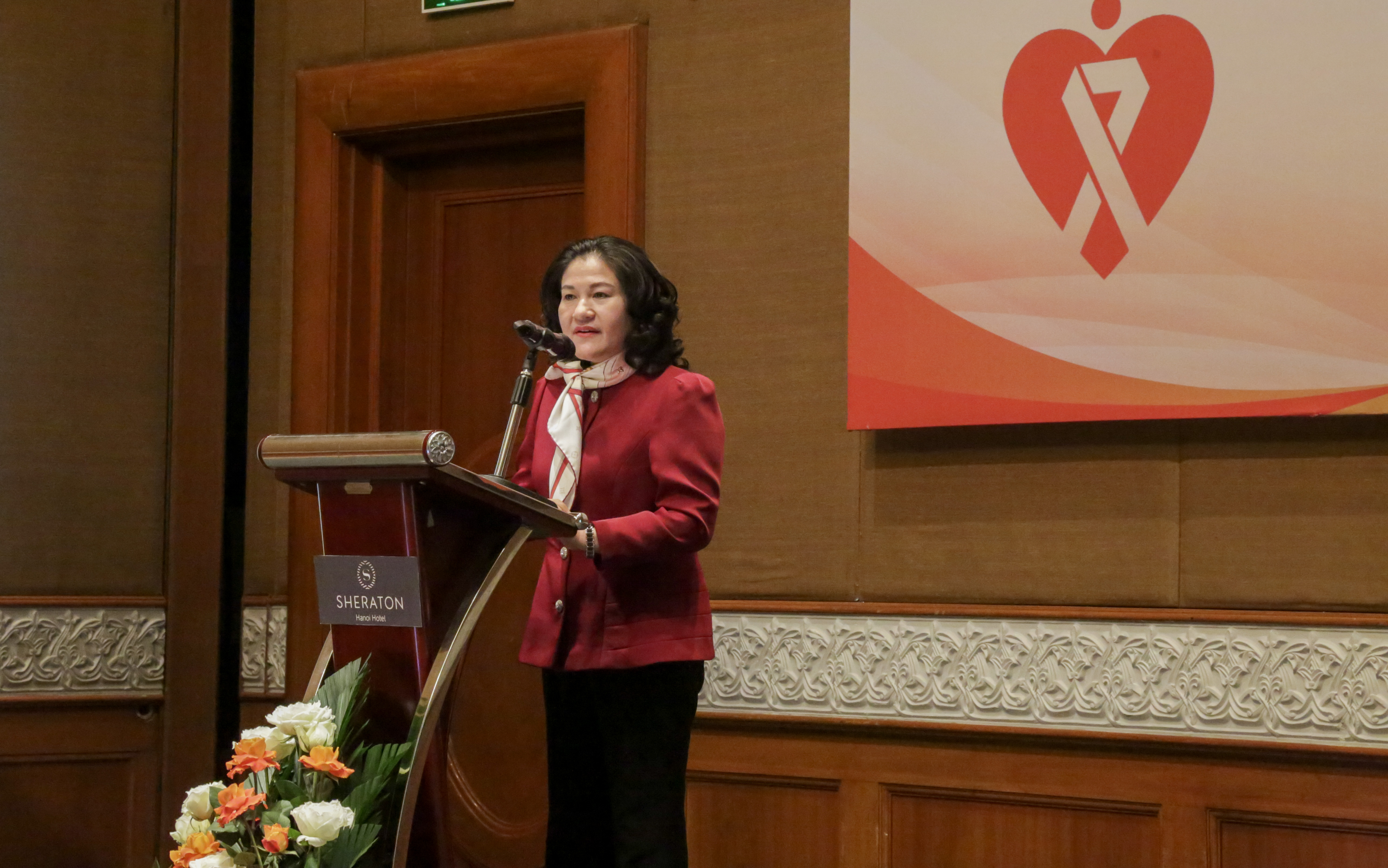 Thứ trưởng Bộ Lao động - Thương binh v&agrave; X&atilde; hội Nguyễn Thị H&agrave; ph&aacute;t biểu tại hội thảo.