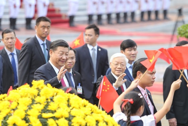 Tổng Bí thư Nguyễn Phú Trọng đón Tổng Bí thư, Chủ tịch nước Tập Cận Bình thăm Việt Nam tháng 11/2017 - Ảnh: TTXVN