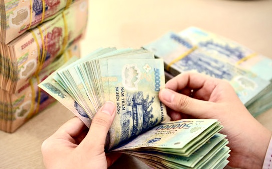  Lương tối thiểu sẽ khó thực hiện tăng vào thời điểm 1/1. Ảnh: Dũng Hiếu.