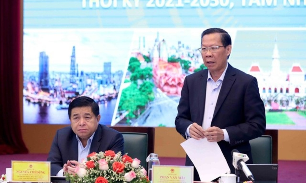 Bộ trưởng Bộ Kế hoạch và Đầu tư Nguyễn Chí Dũng và Chủ tịch UBND TP.HCM Phan Văn Mãi đồng chủ trì Hội thảo sáng 28/2.