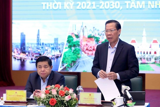 Bộ trưởng Bộ Kế hoạch và Đầu tư Nguyễn Chí Dũng và Chủ tịch UBND TP.HCM Phan Văn Mãi đồng chủ trì Hội thảo sáng 28/2.