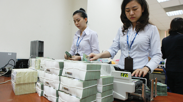 Doanh nghiệp chật vật với bất ổn của lãi suất và tỷ giá