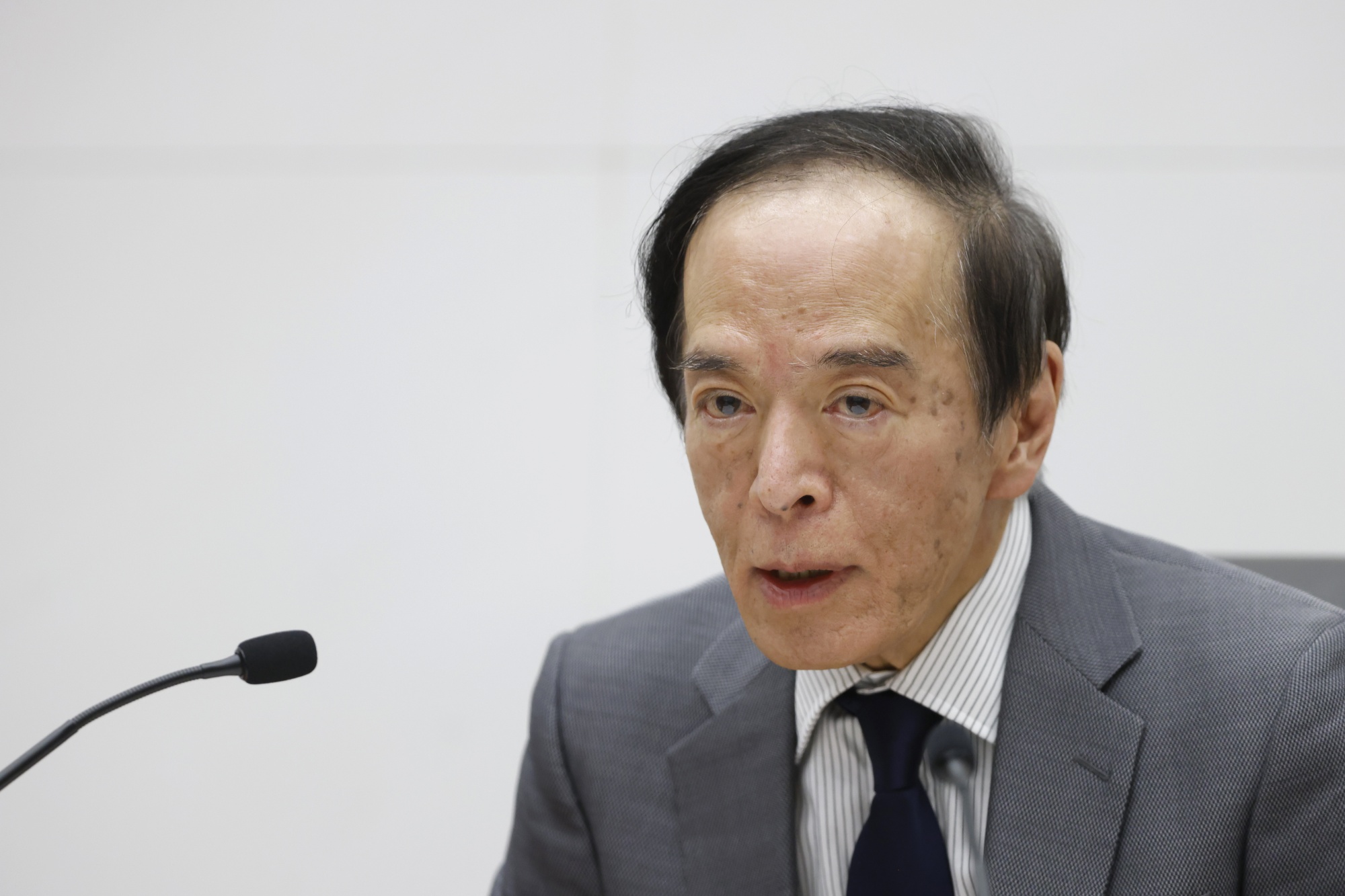 Thống đốc BOJ Kazuo Ueda - Ảnh: Bloomberg.