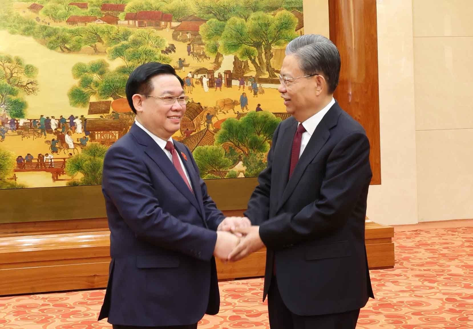 Chủ tịch Quốc hội Vương Đình Huệ và Ủy viên trưởng Ủy ban Thường vụ Đại hội đại biểu Nhân dân toàn quốc nước Cộng hòa Nhân dân Trung Hoa Triệu Lạc Tế. Ảnh: Quốc hội