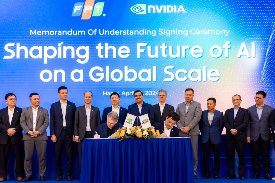 The signing ceremony. (Photo source: FPT)
