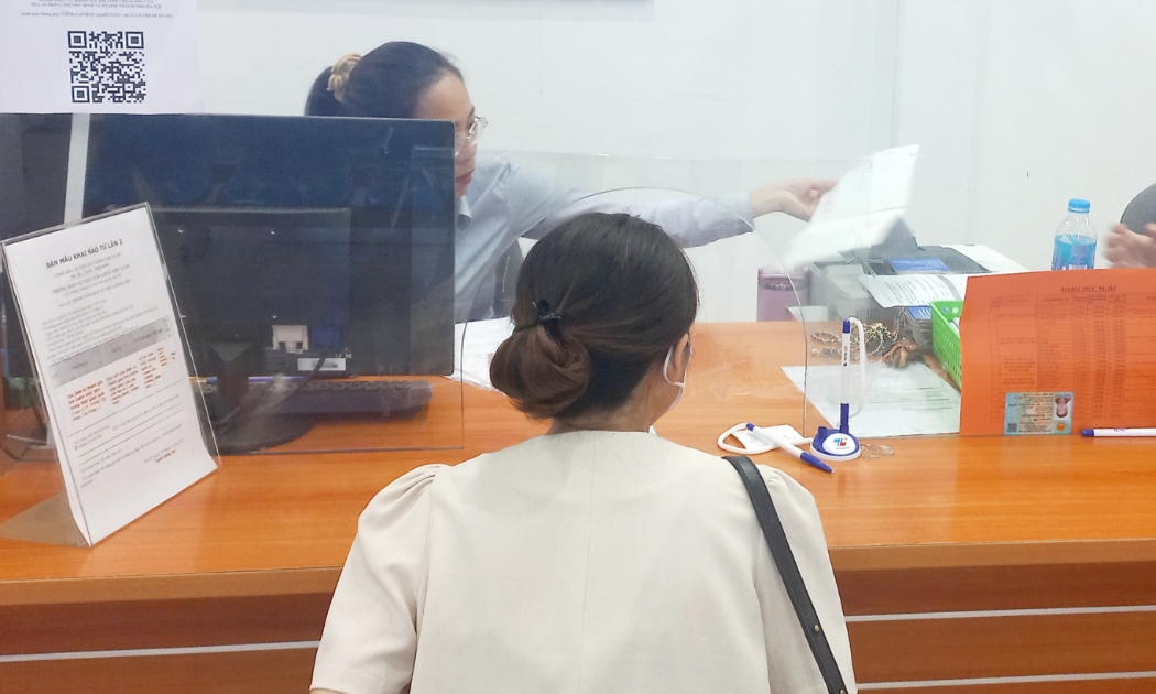 Người lao động hưởng trợ cấp thất nghiệp tại Hà Nội. Ảnh: N.Dương.