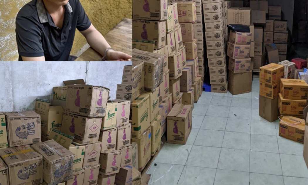 Đối tượng cầm đầu Trần Văn Sơn và số nước giặt, nước rửa bát giả. Ảnh Công an Thanh Hóa cung cấp