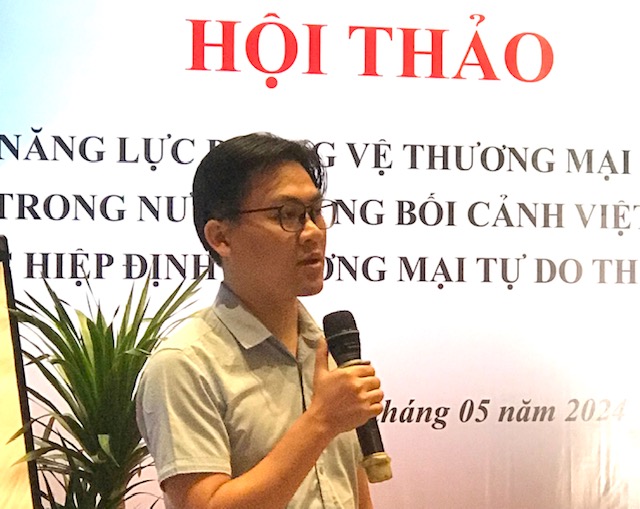 Ông Đặng Xuân Tâm, Chánh Văn phòng Cục Phòng vệ thương mại trình bày tham luận tại hội thảo. Ảnh: Ngô Anh Văn.