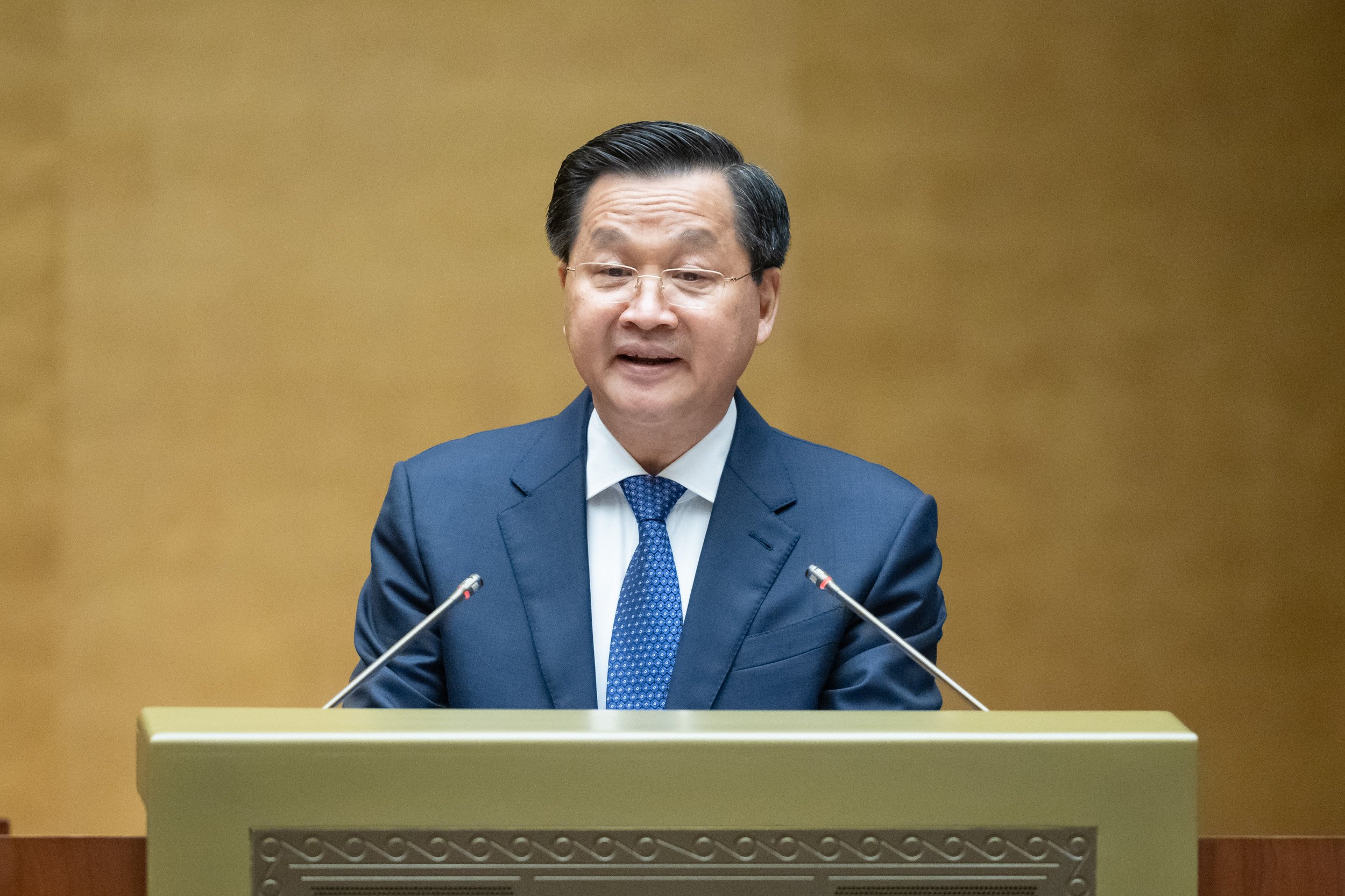Phó Thủ tướng Lê Minh Khái trình bày báo cáo trước Quốc hội tại kỳ họp thứ 7 Quốc hội khóa XV sáng 20/5 - Ảnh: Quochoi.vn