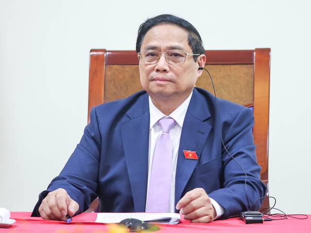 Prime Minister Pham Minh Chinh during the phone talks with Dutch Prime Minister Mark Rutte on May 22. (Photo: VGP)