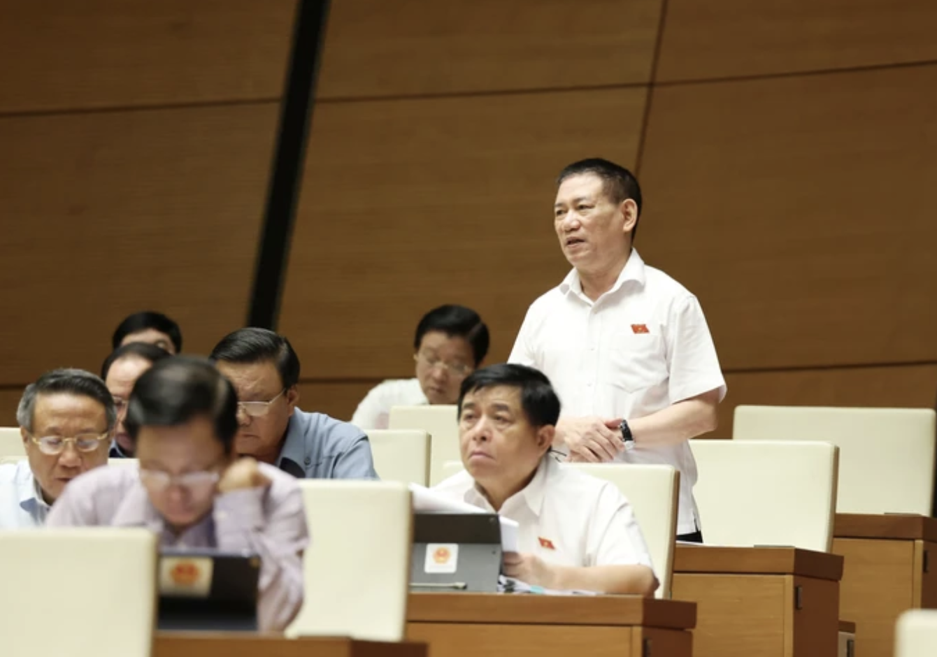 Bộ trưởng Bộ Tài chính Hồ Đức Phớc phát biểu tại phiên chất vấn 5/6. Ảnh: SGGP.