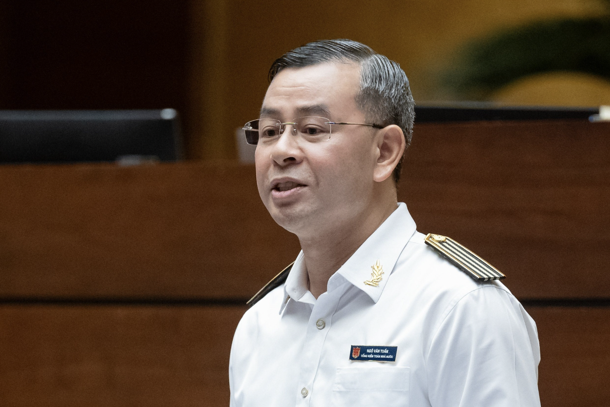 Tổng kiểm toán Nhà nước Ngô Văn Tuấn trả lời đại biểu quốc hội nhiều vấn đề liên quan đến ngành - Ảnh: Quốc hội. 
