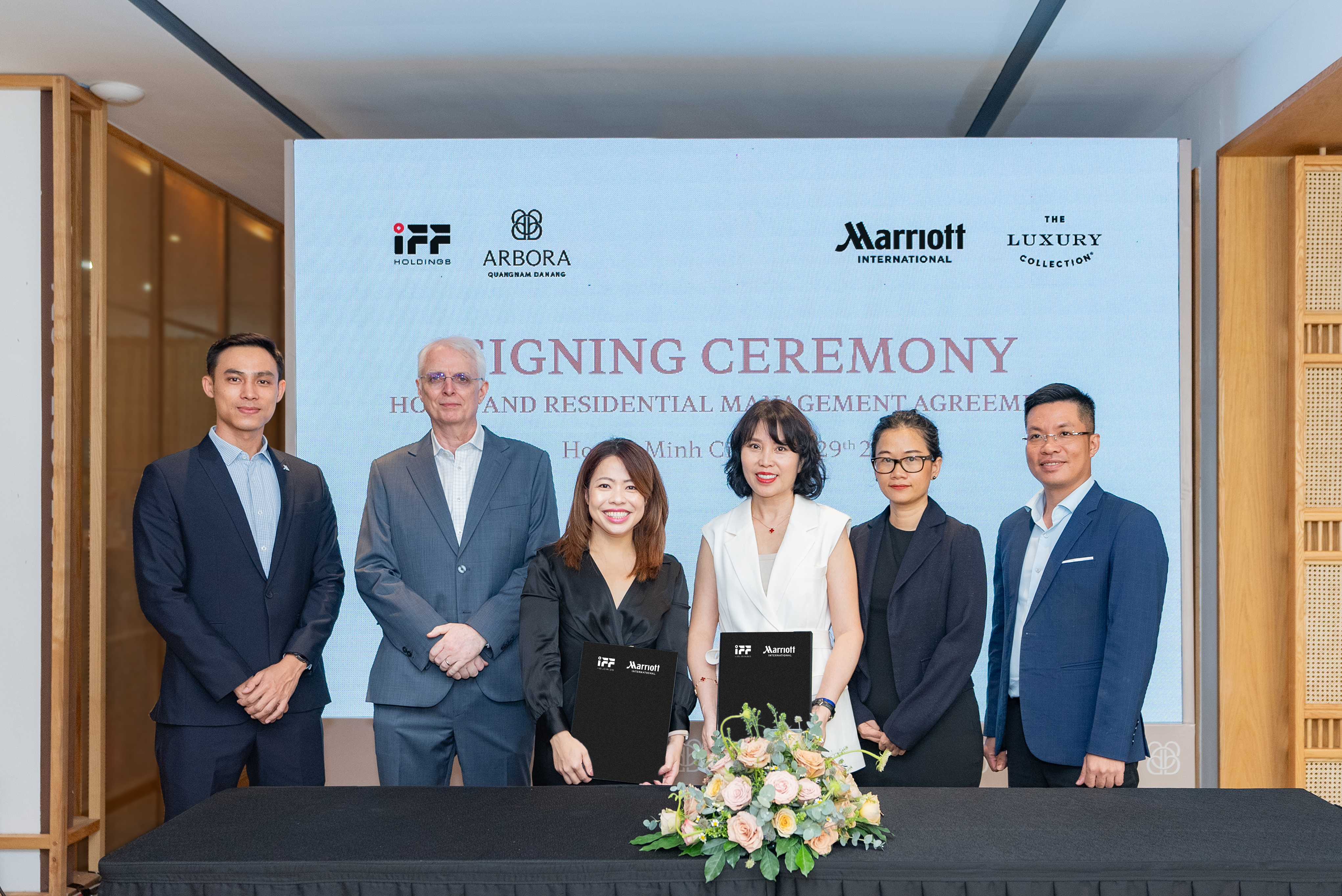 Representatives from Marriott International and IFF Holdings