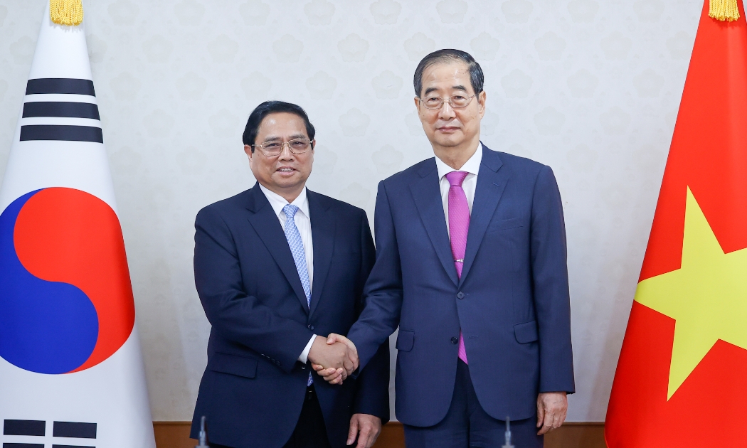 Thủ tướng Hàn Quốc Han Duck Soo hoan nghênh chuyến thăm chính thức Hàn Quốc của Thủ tướng Phạm Minh Chính - Ảnh: VGP