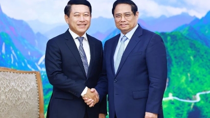 PM Pham Minh Chinh receives Lao Deputy PM and Foreign Minister