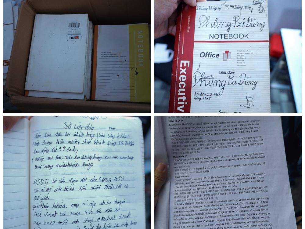 Lực lượng chức năng ph&aacute;t hiện, thu giữ h&agrave;ng chục cuốn sổ ghi ch&eacute;p lại c&aacute;c kịch bản lừa đảo.&nbsp;Ảnh: Cổng th&ocirc;ng tin điện tử Bộ C&ocirc;ng an.