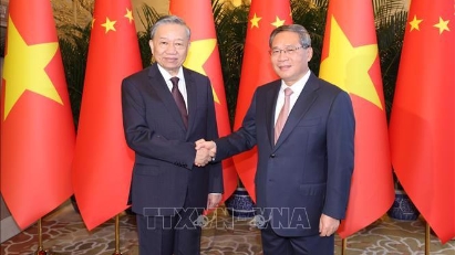 Vietnamese top leader proposes China to promote cooperation in hi-tech fields