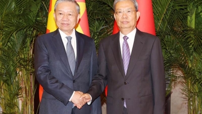 Party General Secretary and State President To Lam meets with top Chinese legislator