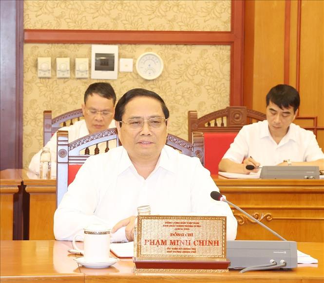 Thủ tướng Phạm Minh Ch&iacute;nh tại cuộc họp - Ảnh: TTXVN