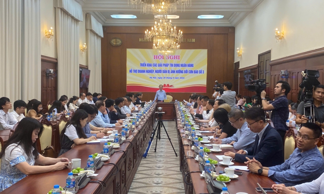 Hội nghị Triển khai các giải pháp tín dụng ngân hàng hỗ trợ doanh nghiệp, người dân bị ảnh hưởng bởi cơn bão số 3 .